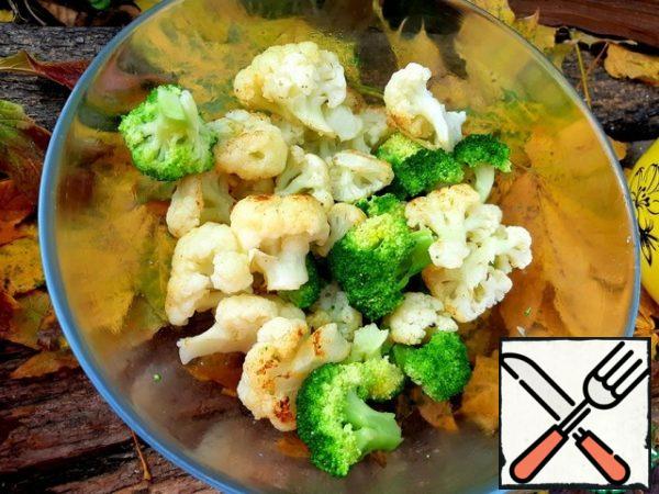 Lower in boiling water for 4-5 minutes. Then fry the cauliflower.