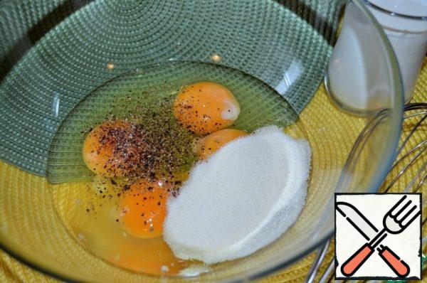 Turn the oven on to heat.
In a bowl, mix the eggs, semolina, milk, pepper mixture.