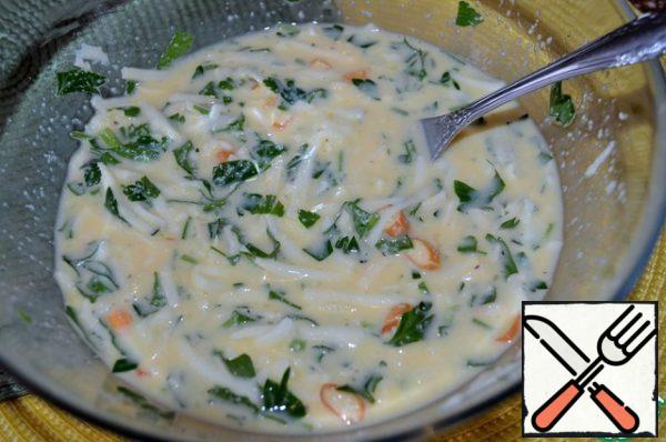 Add cheese, chopped parsley
and vegetable oil to the egg mixture, mix.
