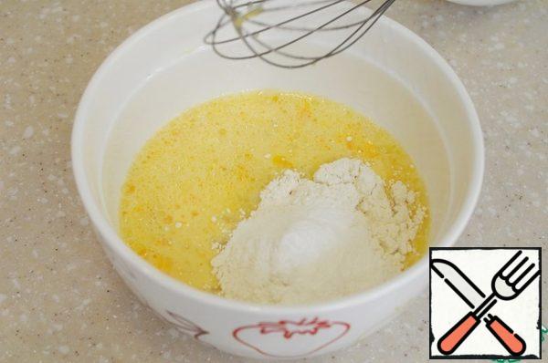 Sift flour with baking powder and mix. The dough will be quite liquid.