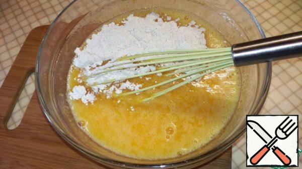 Now gradually add the flour mixture. Stir to avoid lumps.