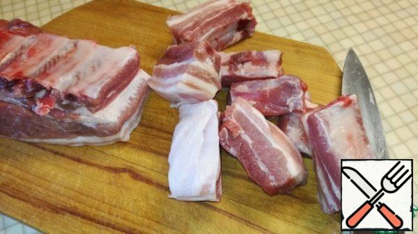 Pork ribs are well washed and cut into portions.