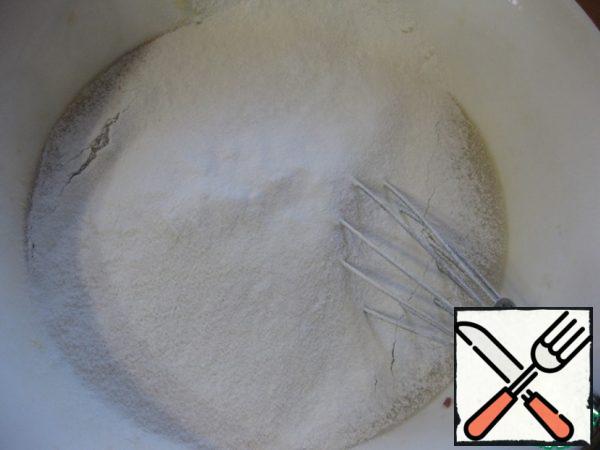 Sift the flour and baking powder into a bowl.
