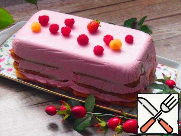 Put the mold in the refrigerator until it hardens. Turn the frozen cake onto a cutting board, take out the mold. Then put the dish on top of the cookies and turn it over on the cake together with the board, remove the board, carefully remove the cake from the film.