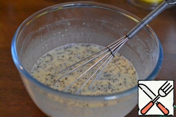 In a separate bowl, combine the cream, milk, eggs, nutmeg, black pepper and dry Basil. Beat lightly with a whisk.