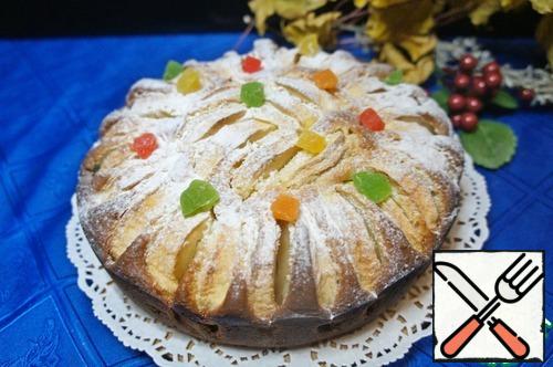 Ready cake cool slightly in shape, then extract it, put it on a wire rack and cool completely. Then put on a dish and sprinkle with powdered sugar and candied fruits.