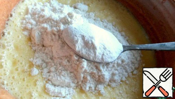 Add flour with baking powder.