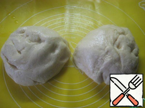 Knead it, divide it into two parts.

