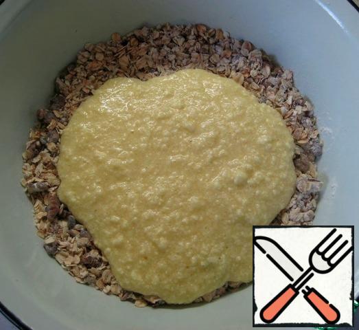 Add the egg-oil mixture to the dry ingredients.