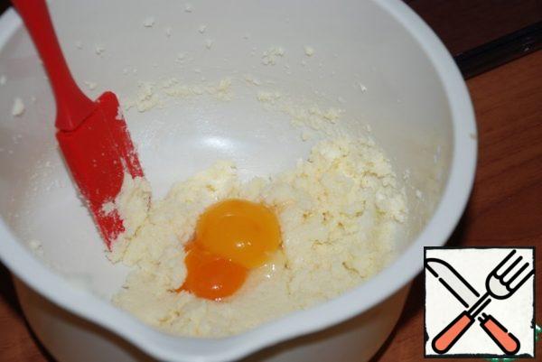 Add the yolks and whisk.