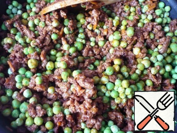 Add the frozen green peas and cook for another 1-2 minutes to warm it up.
