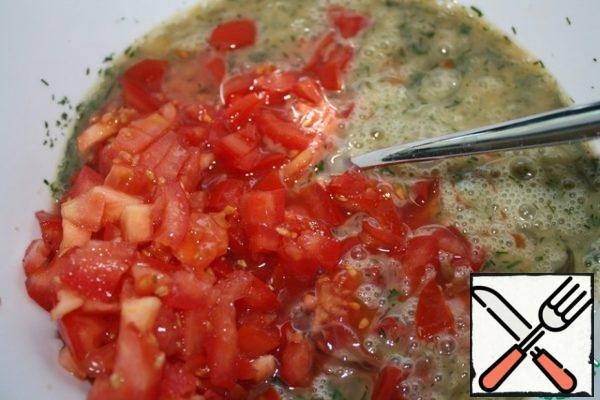 Also finely chop the tomato and add to the beaten eggs.
Add salt and pepper to taste.
