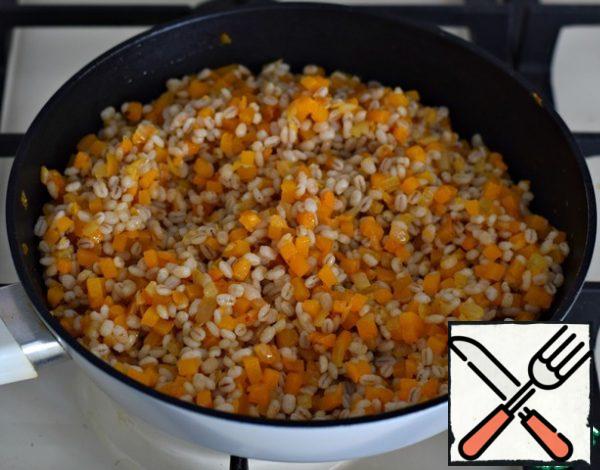 Put the barley in a pan with vegetables, mix, taste the dish for salt. Heat all together for 2-3 minutes over moderate heat.
You're done!