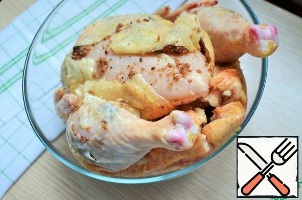 Rub the chicken with salt and mix, trying to get the mixture under the skin.
Cover the chicken with cling film and put it in a cool place for 2-12 hours.
