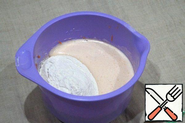 Add flour with baking powder, stir until smooth.