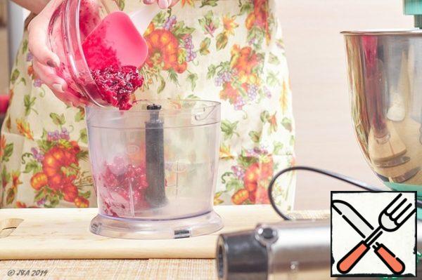 Whisk the berries into a puree.
