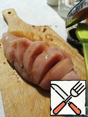Take the soy sauce and brush and grease each pocket fillet and completely.
