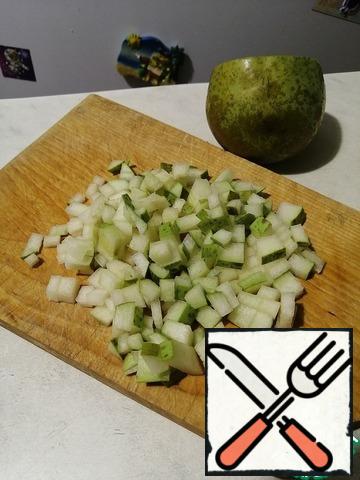 Cut the pear into cubes and add to the mixture and mix with a spoon.