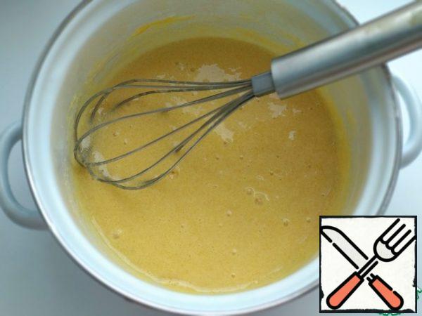 In a saucepan, mix the eggs with the sugar, add the milk and sift the flour. Stir well. Put on a small fire. Continuously stir the mass, especially at the bottom of the pan, to avoid the formation of flour lumps. As soon as the custard thickens and begins to boil, remove from the stove.