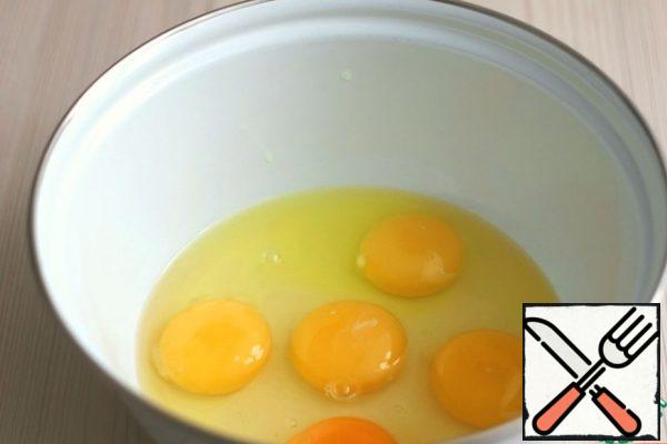 Add 5 eggs to the bowl.
