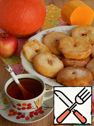 Lightly sprinkle the doughnuts with powdered sugar or cinnamon, as You like. To eat better hot. From such a number of test is obtained where the 18 donuts. The diameter of the pumpkin circles is 8 cm. Bon appetit!