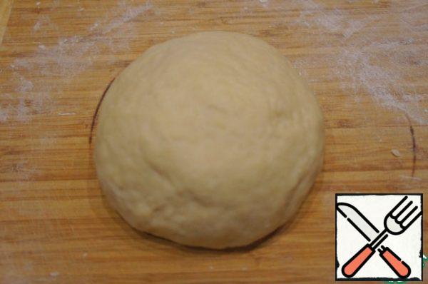 Add the flour, knead the soft dough, wrap in foil, put in the refrigerator for 30 minutes.