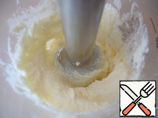 Beat the butter at room temperature with the sugar.