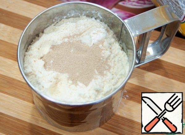 Add flour and yeast.
