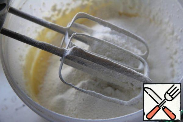Enter the flour with baking powder. Stir.