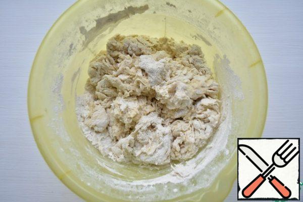 Knead the dough in a bowl until the flour absorbs all the moisture.