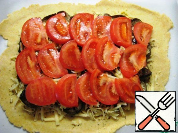 Put the tomato slices on top.