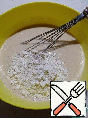 Add flour and baking powder, stir until smooth.