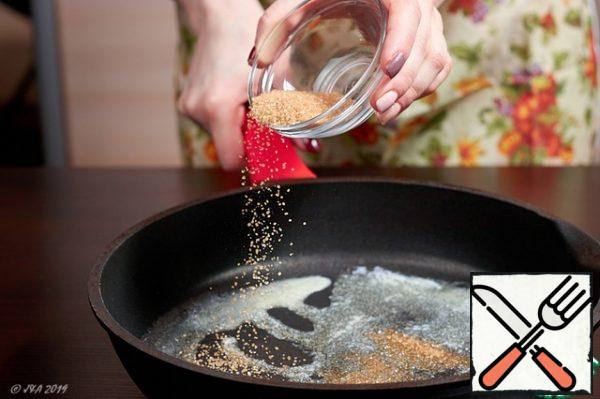 Pour sugar, spices into the melted butter and heat it up a little
