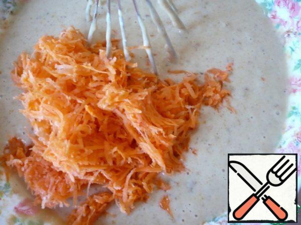 A, then add the grated carrots. Mix everything.
