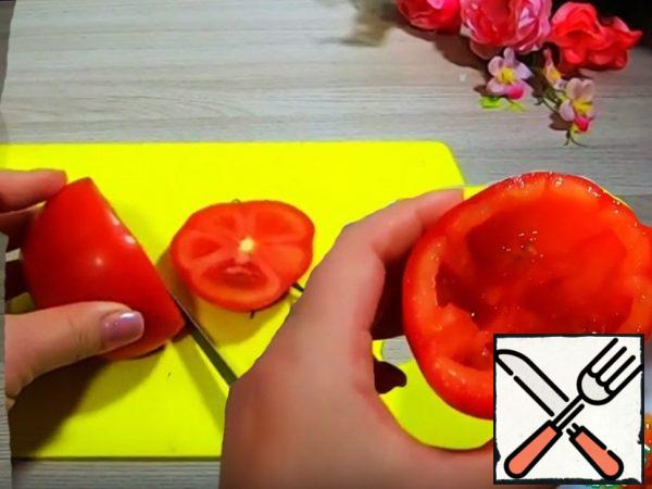 Cut off the top of the tomato, remove the inside of the tomato