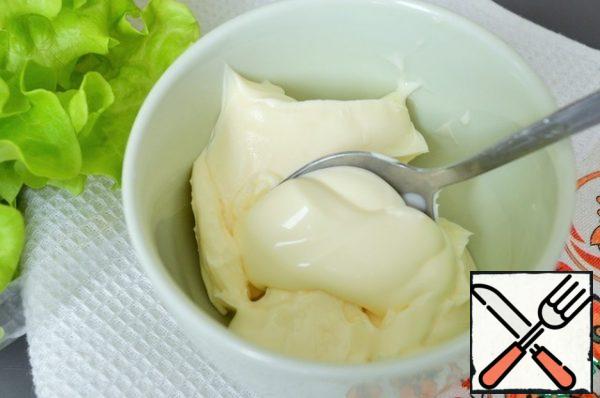In a bowl, mix cheese and mayonnaise.