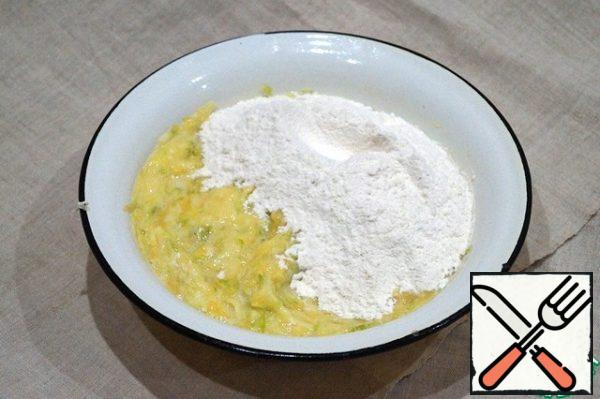 Add flour with baking powder, stir. Should make a thick, viscous dough.