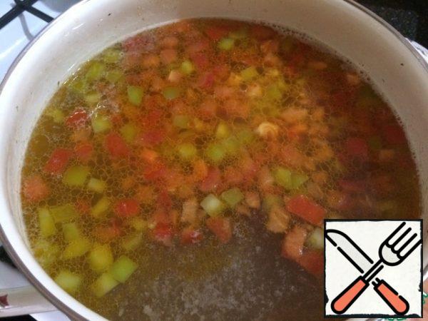 In the pot with the future soup add canned corn, our vegetables and cook until tender. Add the chopped herbs and onions, and keep on fire for a couple of minutes. Turn off the heat and leave to languish under the lid for 5 minutes.