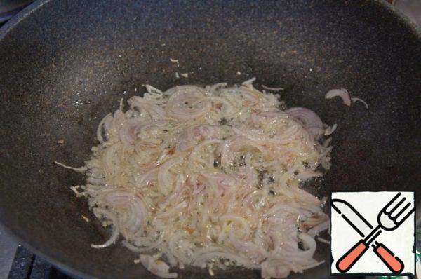 Fry the onions until transparent.