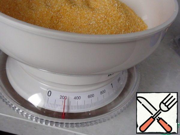 My volume of cereals-about 215 grams, it is difficult to say more precisely, but it is not so important. Take 210-220, make no mistake. Here you can see on the scales.
