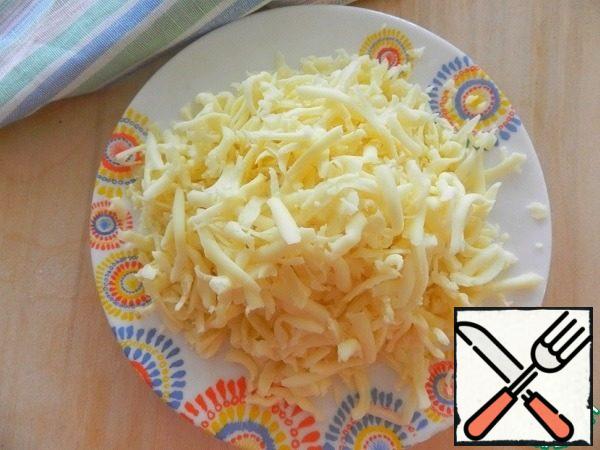 Grate cheese on a grater. It is better to take mozzarella or Suluguni.