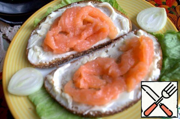 Spread with a layer of melted cheese or butter.
