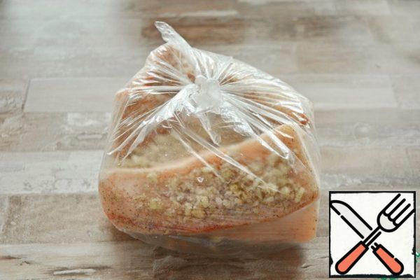Put everything in a bag or container (along with the remains of salt and garlic), leave it indoors overnight, then put it in the refrigerator for 3-5 days.
