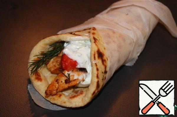 Lavash with gyros, zaziki, tomatoes and onions is one of the favorite dishes of the Greeks and their guests!