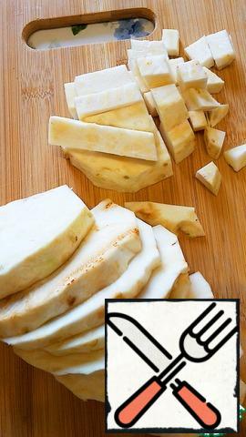 Peel and cut the celery and potatoes into cubes.