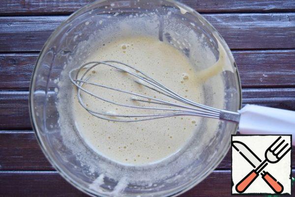 Put a bowl with the yolk mixture in a water bath and continuously stirring with a whisk bring it to a thickening. At this stage, the sugar crystals will completely dissolve. Cool completely.