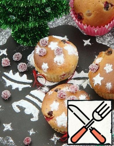 Sprinkle the muffins with powdered sugar and decorate to your liking. I used candied cranberries.