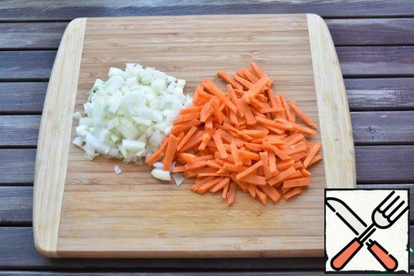 Carrots and onions cut into strips. Not too small.