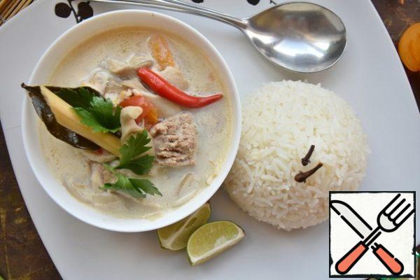 Serve the soup with chopped coriander and spicy crumbly rice.