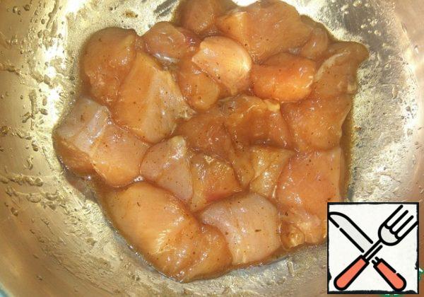 Put the chopped fillets in a bowl. Add vegetable oil, soy sauce, salt and spices. Mix it. Cover with cling film and leave to marinate at room temperature for at least 30 minutes. I usually leave it for 1 hour.
